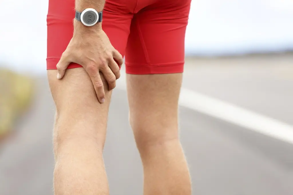 Athlete runner who benefits from Thai massage for performance