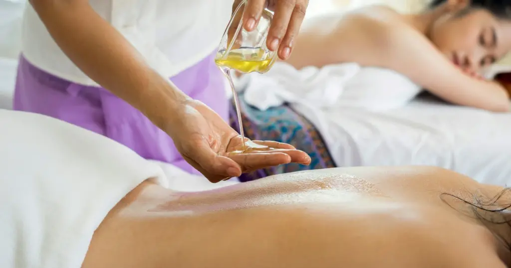 Thai massage targeting lower back pain