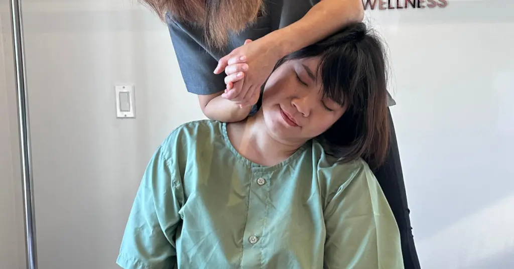 Thai massage neck and shoulder tension relief