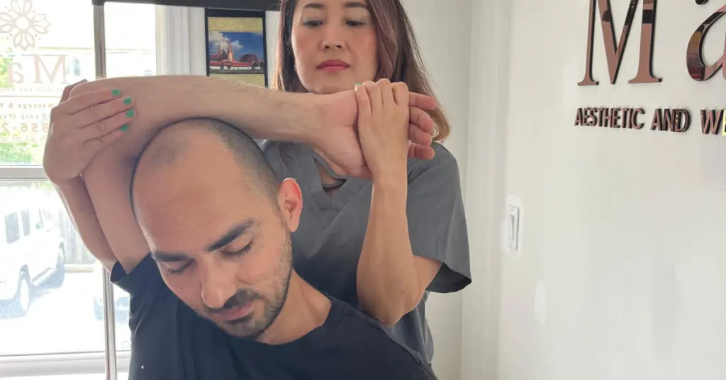 Thai massage for muscle tension
